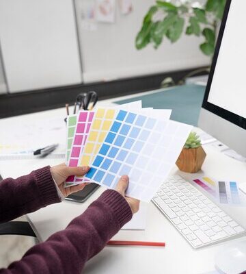 young-female-designer-choosing-right-colors-logo_23-2149142109
